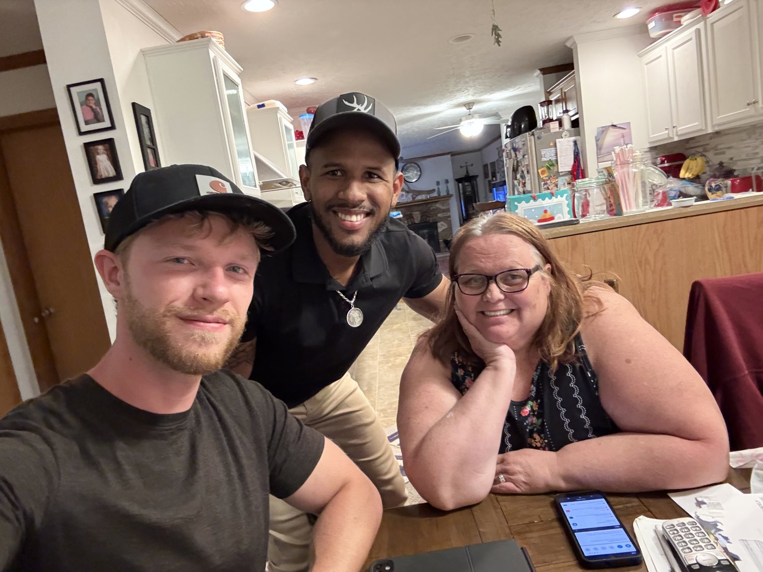 Brady at kitchen table with an Illinois homeowner