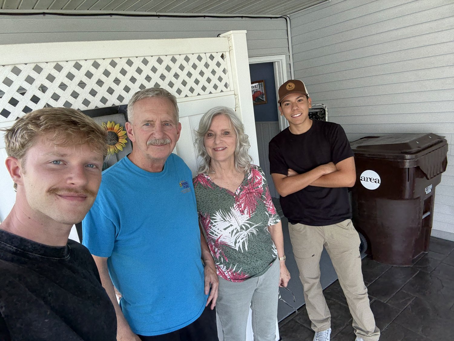 Brady and the team with an Illinois homeowner family